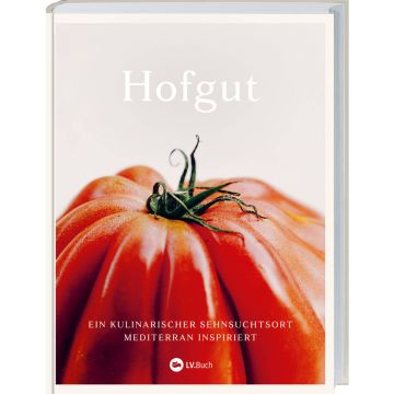 Das Buchcover zeigt in Nahaufnahme eine rote Tomate mit grünem Stil. Der Buchtitel "Hofgut" steht oben, darunter der Untertitel "Ein kulinarischer Sehnsuchtsort mediterran inspiriert". Ein Logo mit dem Text "LV.Buch" ist unten zentriert.