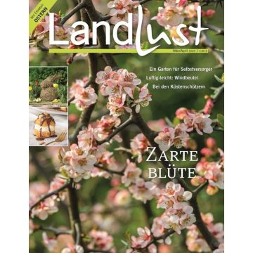 Titelbild der Zeitschrift „Landlust“ März/April 2022 mit blühenden Obstbaumzweigen, Texten zu Gartenthemen und Küstenschutz,  kleinem Osterhinweis und zwei Fotos von Windbeuteln und einem Gartenarrangement.