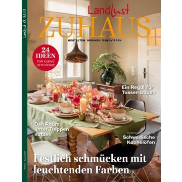 Cover des Magazins "Landlust Zuhause" Winter 2023/2024. Zeigt einen festlich gedeckten Tisch mit bunten Dekorationen. Themen: Geschenkeideen, Regalbau, Platznutzung unter Treppen, schwedische Kachelöfen.