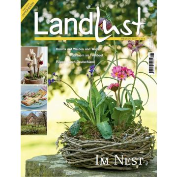 Titelblatt der Landlust-Ausgabe März/April 2023. Hauptbild zeigt ein Nest aus Zweigen mit Frühlingsblumen. Oben Themen wie Weidenkunst und Gärtnern. Seitlich Bilder von Filzhäschen, einem Gericht und einem Fachwerkhaus. Preis: 4,80 Euro.